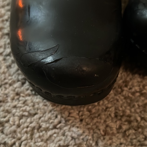 Two pairs of Dansko shoes one pair of Mary Jane the other are multi colored. - Picture 8 of 8